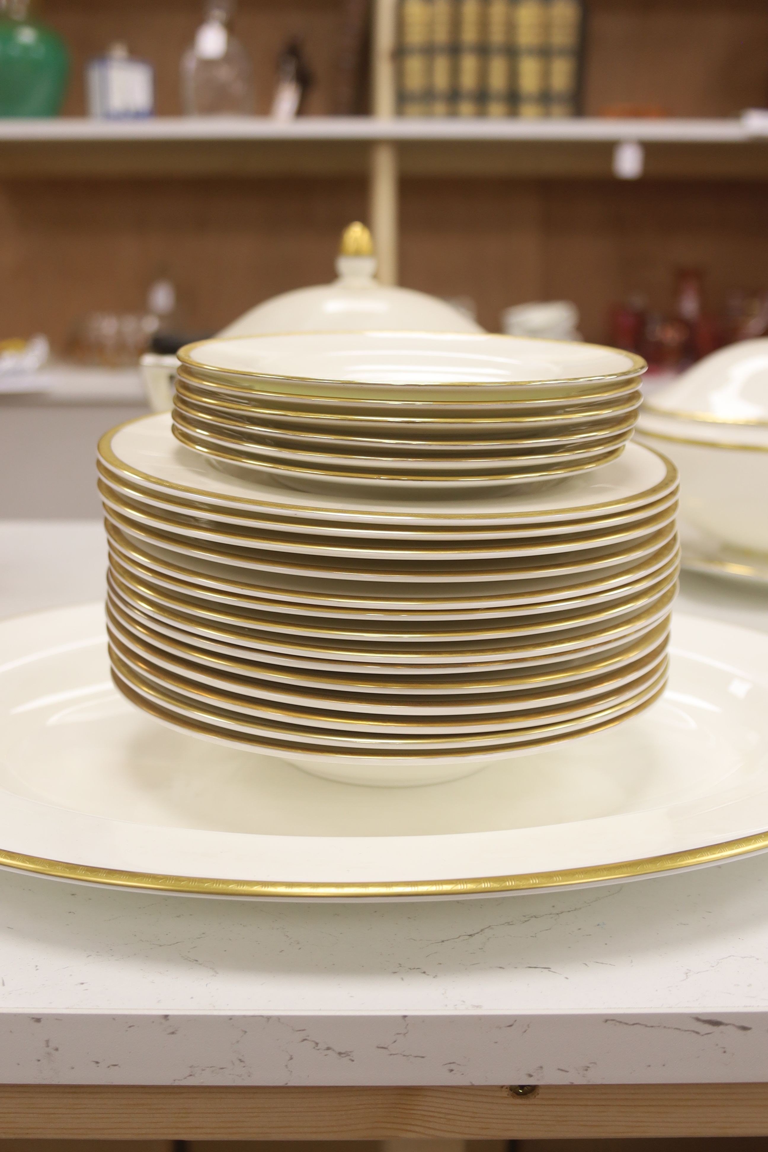 A Minton 'Golden Heritage' gilt bordered dinner service